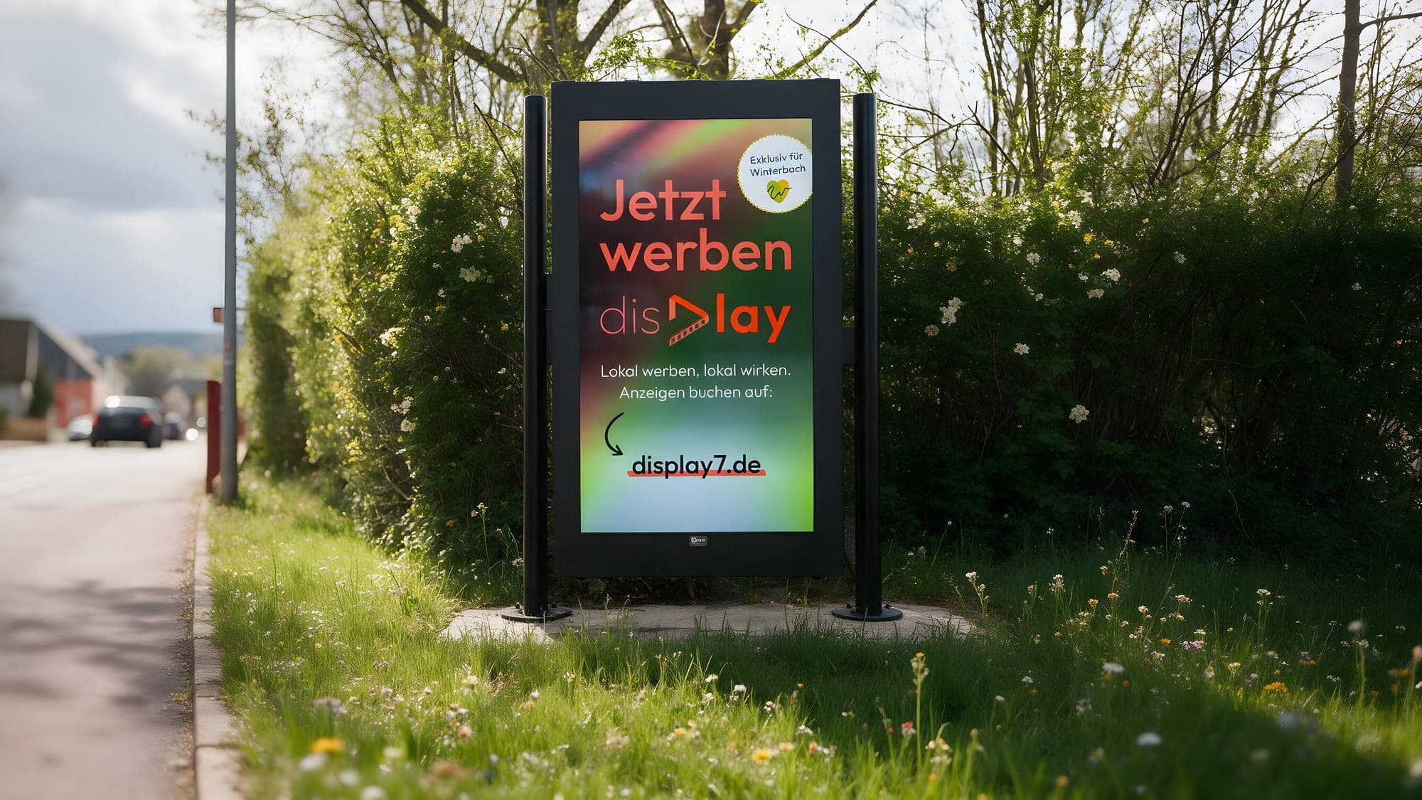 Digitale Werbetafel von Display 7 an einer Straße in Winterbach